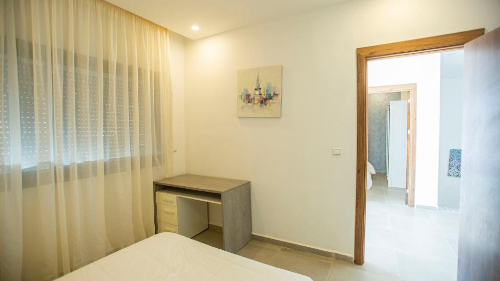 Postel nebo postele na pokoji v ubytování Villa Sahara Line