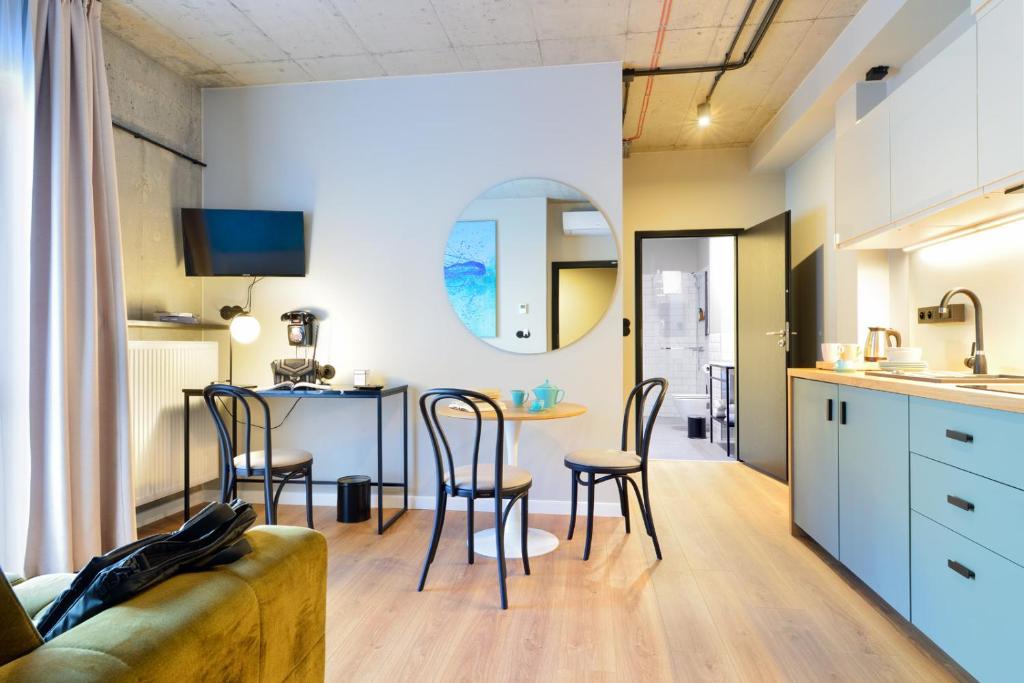 
Two room studio with kitchen - FABRYKA building
