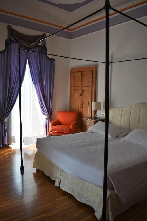 Letto o letti in una camera di Hotel Florence
