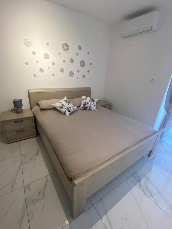 Postel nebo postele na pokoji v ubytování Central, Bright & Modern Apartment