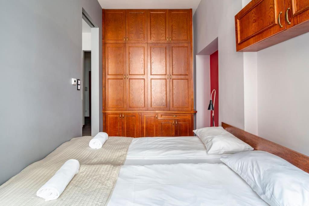 Posteľ alebo postele v izbe v ubytovaní Floriańska Glamour Apartments