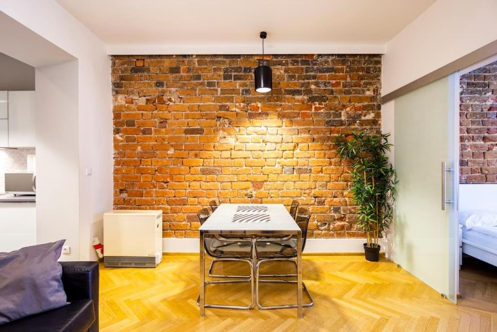 Posteľ alebo postele v izbe v ubytovaní Floriańska Glamour Apartments