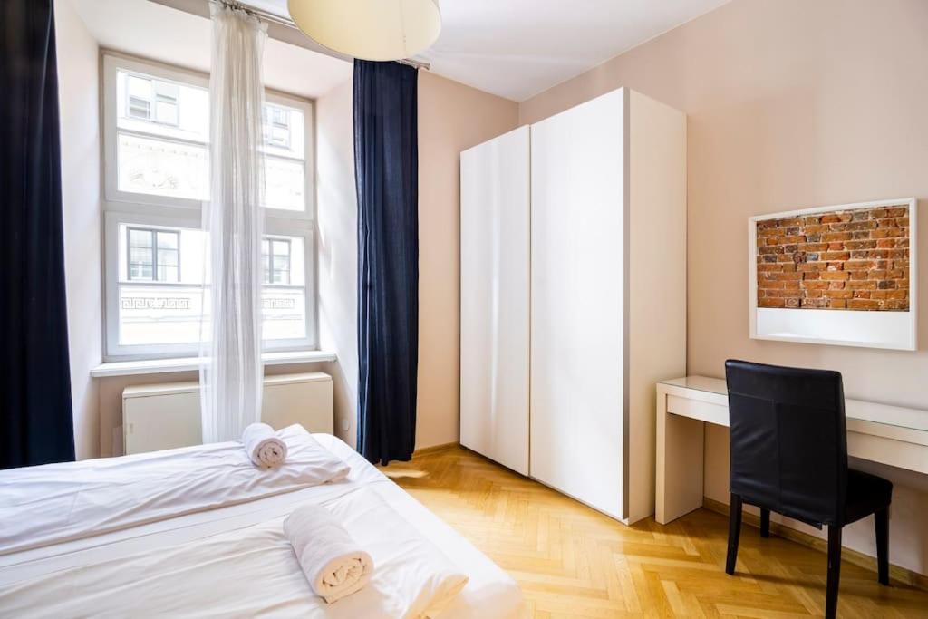 Posteľ alebo postele v izbe v ubytovaní Floriańska Glamour Apartments