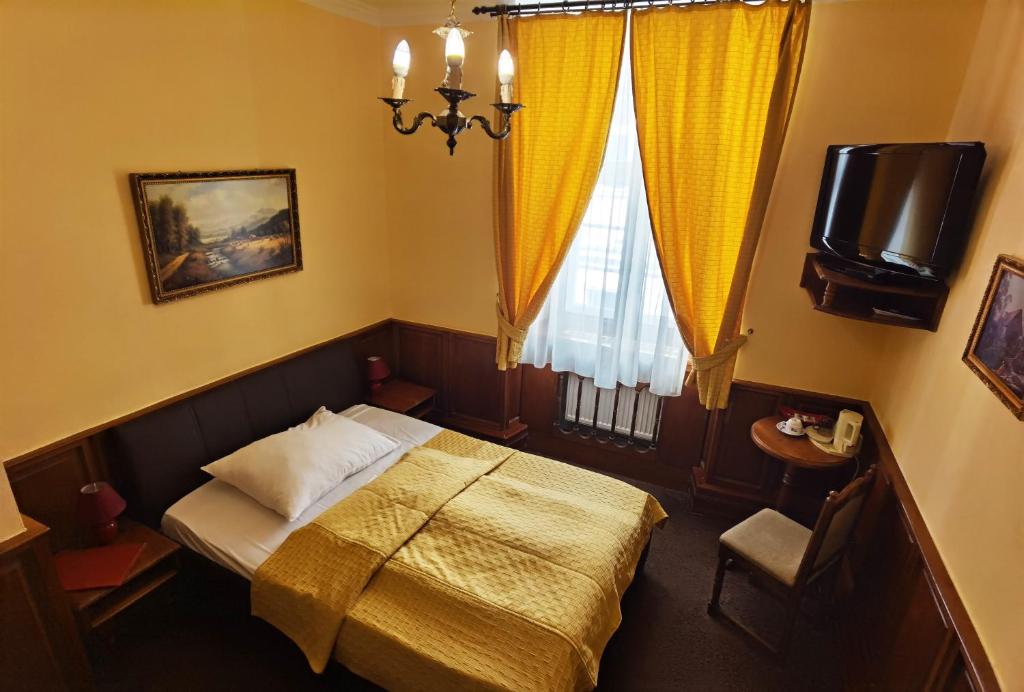 TV a/nebo společenská místnost v ubytování Betlem Club Hotel