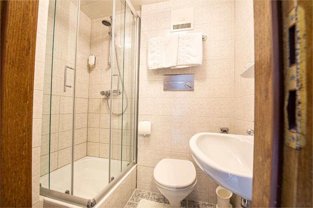 Koupelna v ubytování Hotel Raunig