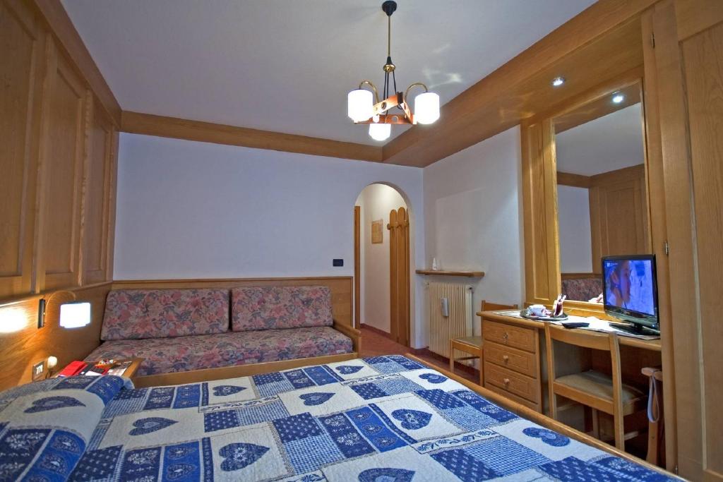 Postel nebo postele na pokoji v ubytování Hotel De Fronz