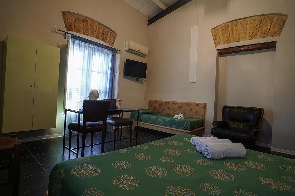 Posteľ alebo postele v izbe v ubytovaní Casa Lerux