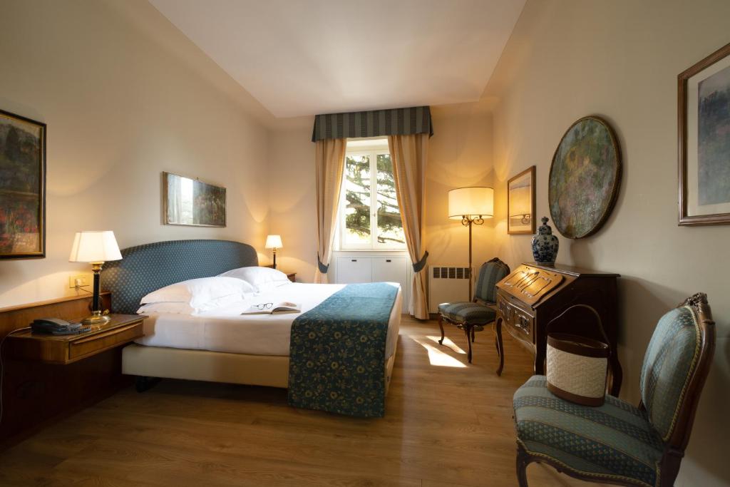 Postel nebo postele na pokoji v ubytování Park Palace Hotel