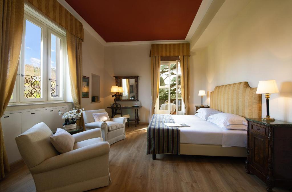 Postel nebo postele na pokoji v ubytování Park Palace Hotel