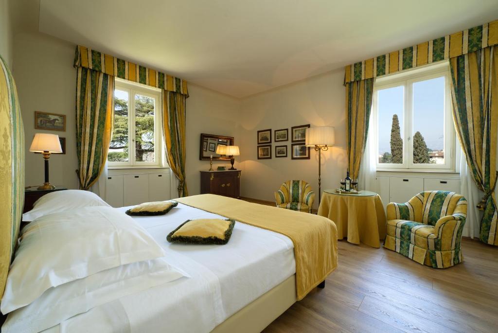 Postel nebo postele na pokoji v ubytování Park Palace Hotel