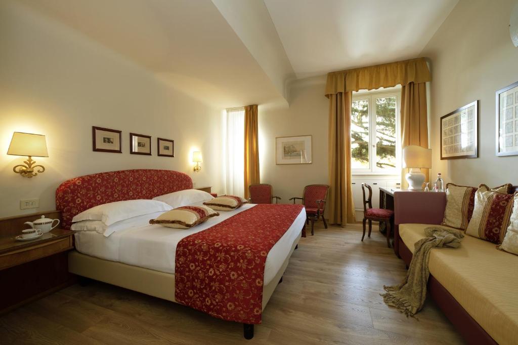 Postel nebo postele na pokoji v ubytování Park Palace Hotel