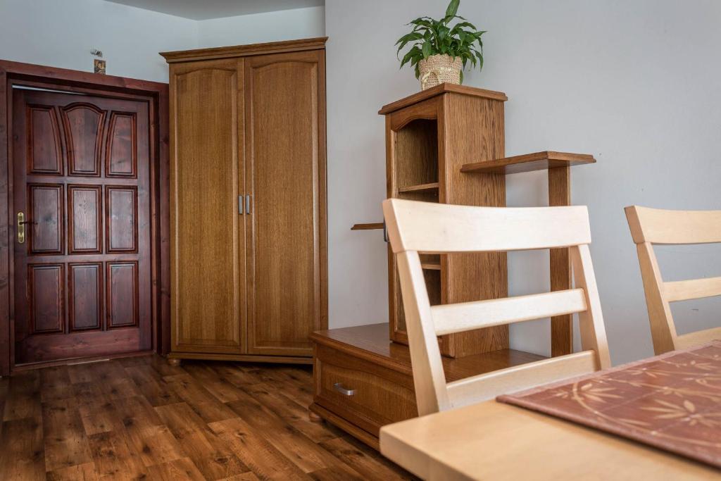 Fotografia z galérie ubytovania Sykowny Dworek Apartamenty v destinácii Kościelisko