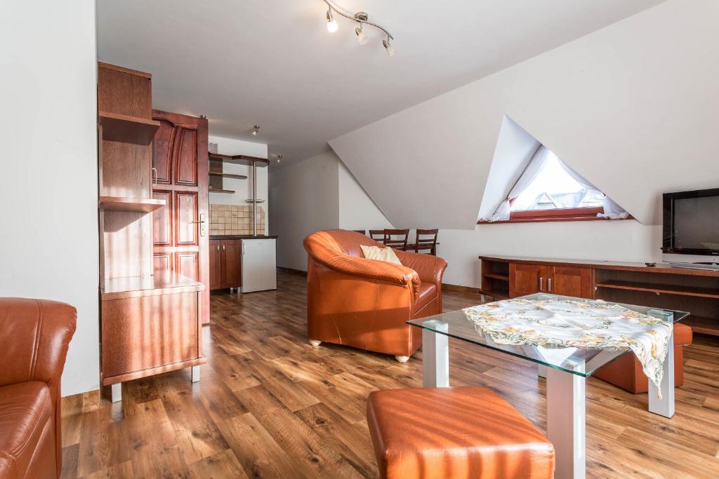 Kuchyňa alebo kuchynka v ubytovaní Sykowny Dworek Apartamenty