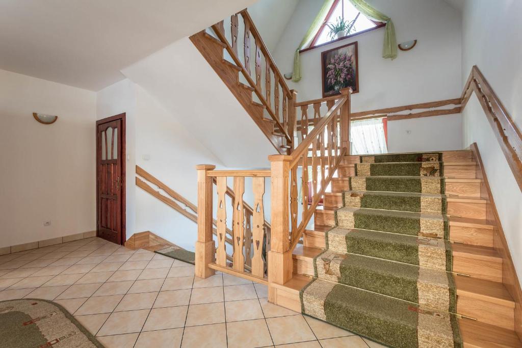 Fotografia z galérie ubytovania Sykowny Dworek Apartamenty v destinácii Kościelisko