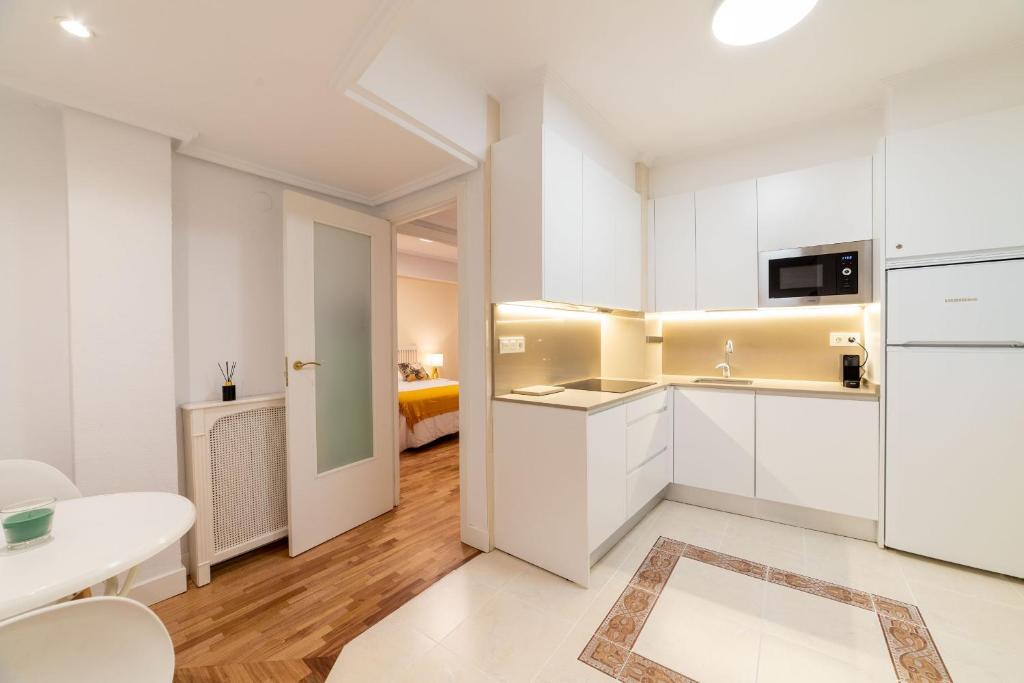 Kuchyňa alebo kuchynka v ubytovaní Cute and comfy apartment by Cisan Rentals