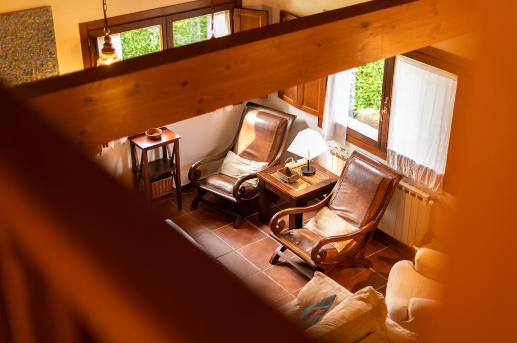 Posezení v ubytování Chalet El Ñeru