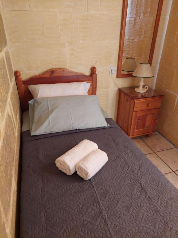 Postel nebo postele na pokoji v ubytování MJ Farmhouse B&B