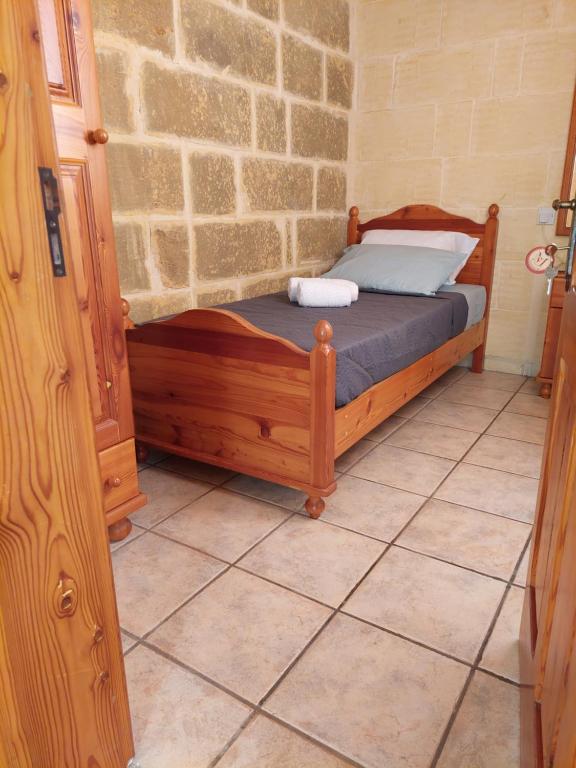Postel nebo postele na pokoji v ubytování MJ Farmhouse B&B