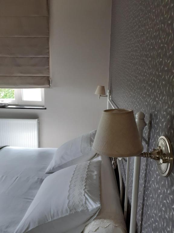 Postel nebo postele na pokoji v ubytování B&B In 't Stille Weg