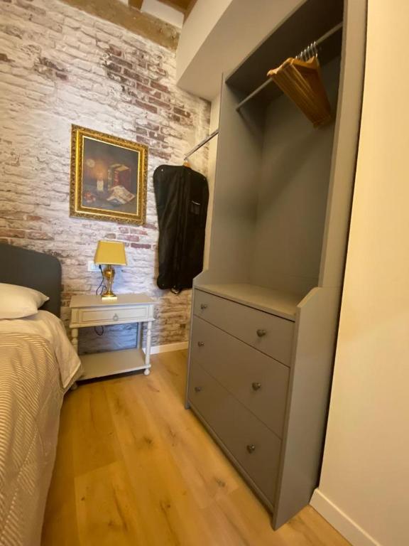 A bed or beds in a room at 30 San Gottardo House