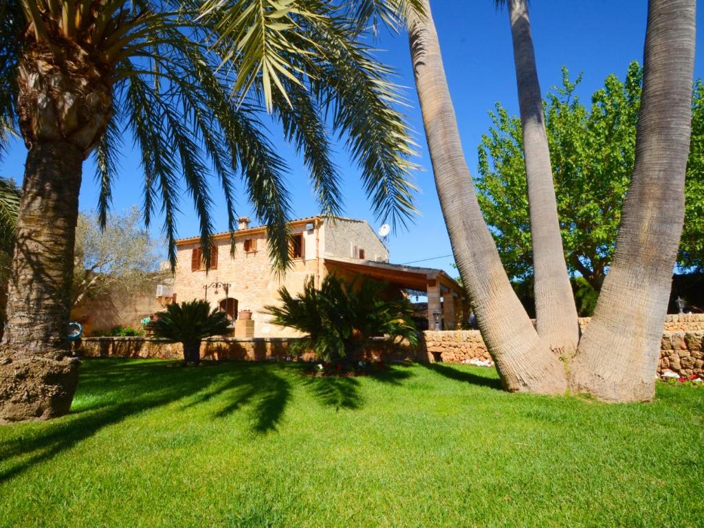 A garden outside Can Rovey, pool and gardens in Inca