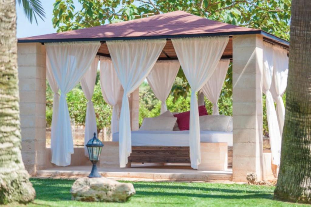 A garden outside Can Rovey, pool and gardens in Inca