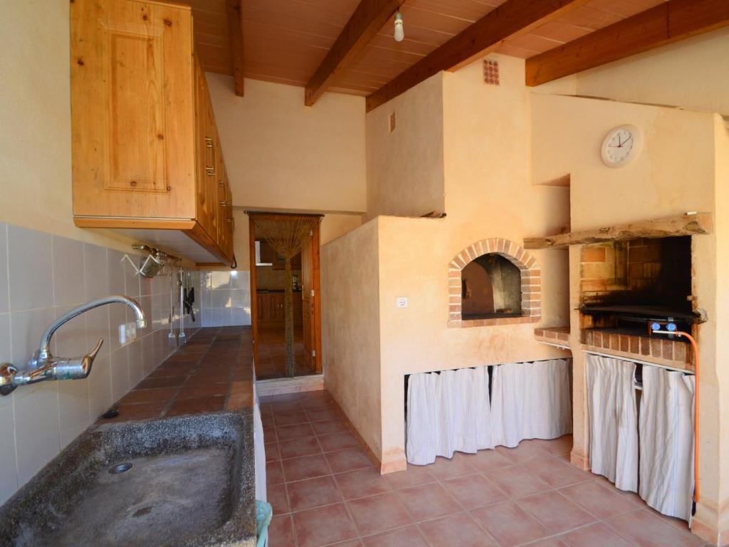 A kitchen or kitchenette at Can Rovey, pool and gardens in Inca