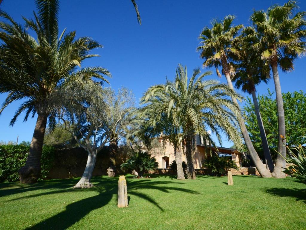 A garden outside Can Rovey, pool and gardens in Inca