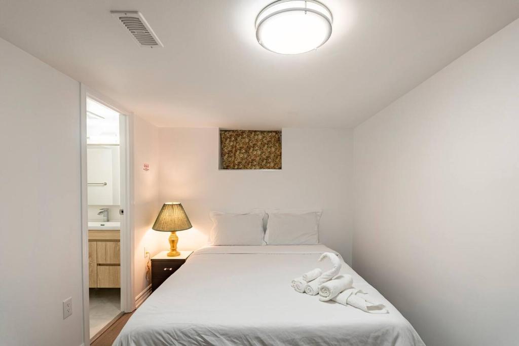 Postel nebo postele na pokoji v ubytování Simple & Tidy Private Rooms