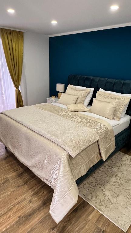 Posteľ alebo postele v izbe v ubytovaní Gold Luxury Room