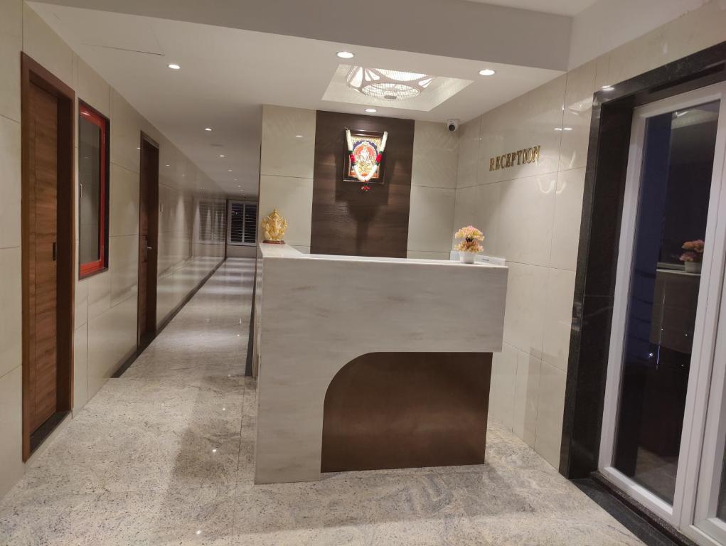 El vestíbulo o zona de recepción de RR Mount Elite Suites