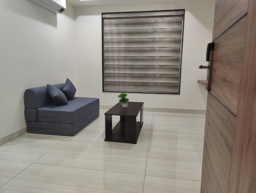 Zona de estar de RR Mount Elite Suites