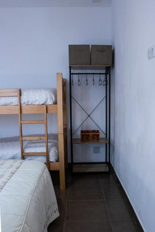 Postel nebo postele na pokoji v ubytování Casa Rural Los Eneares