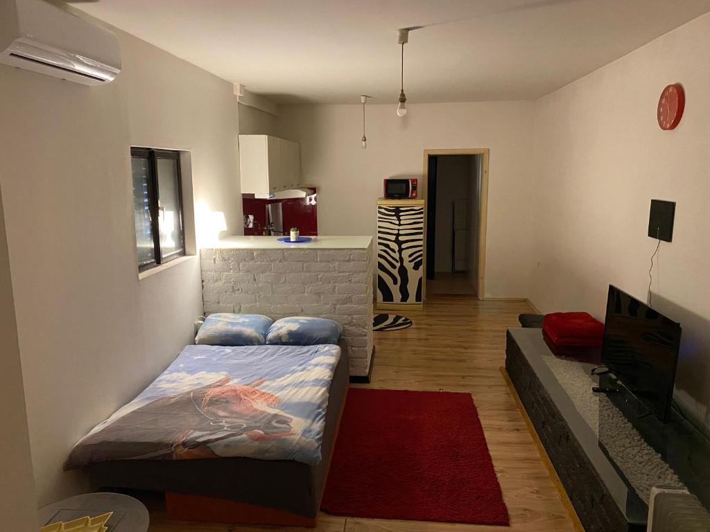Posteľ alebo postele v izbe v ubytovaní Adorable 1-bedroom guesthouse & private parking place