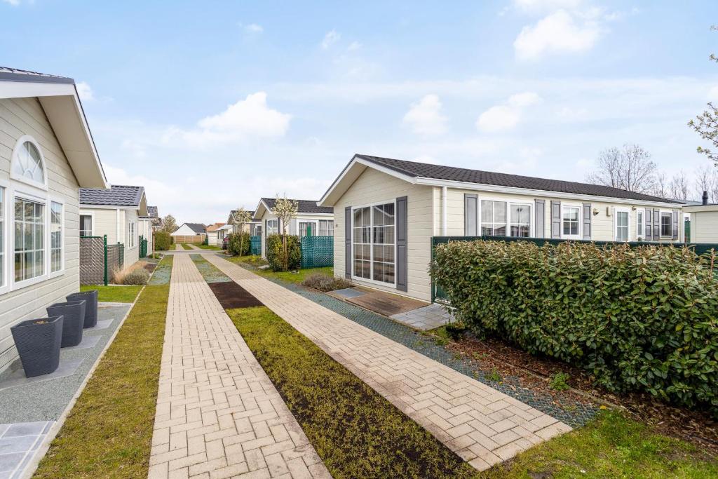 a row of houses in a residential neighborhood at Zeeparken Haerendycke, Seacottage 4223 in Wenduine