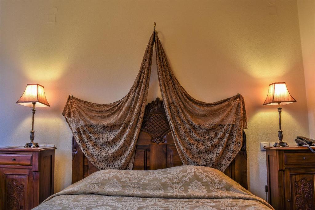 Postel nebo postele na pokoji v ubytování Archontiko Polyzos