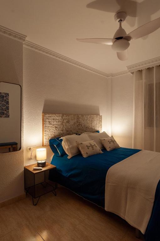 Posteľ alebo postele v izbe v ubytovaní Ketan Suite Nadales