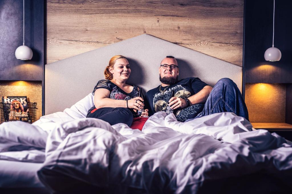 Postel nebo postele na pokoji v ubytování Rock&Chill Hotel Falter
