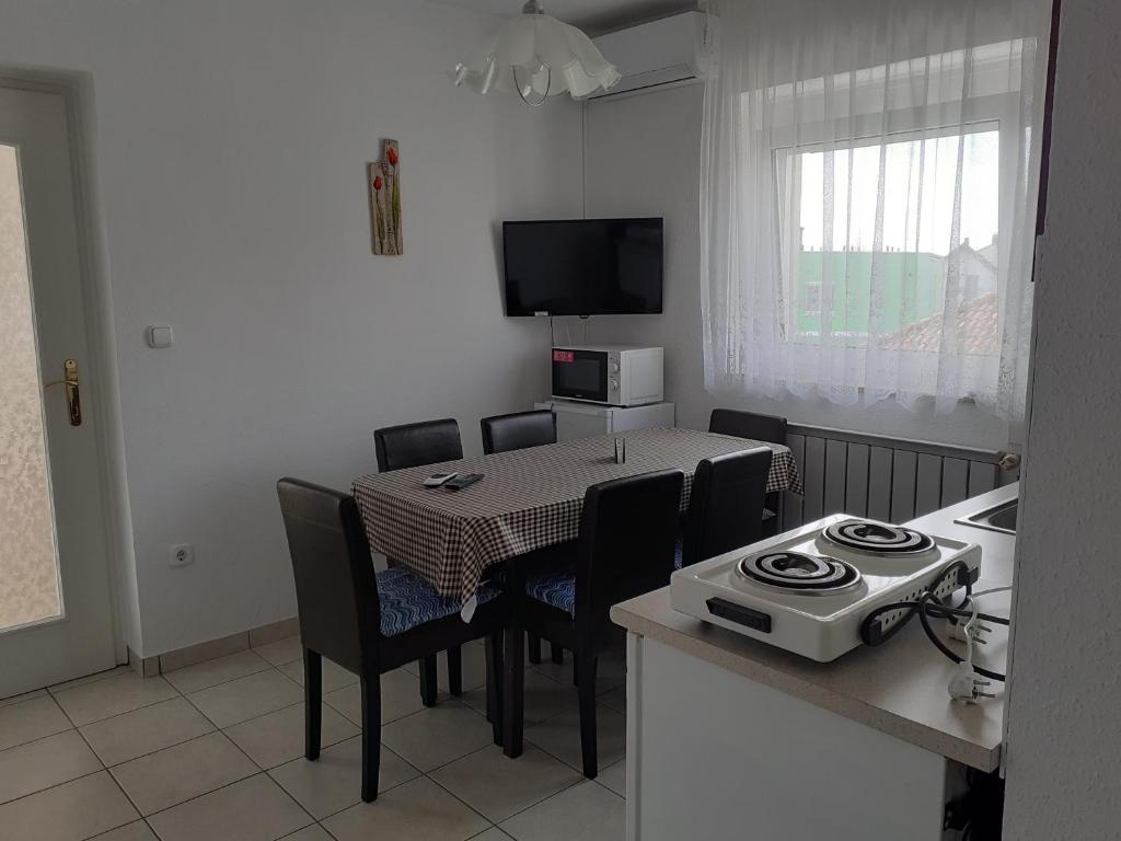 Kuchyňa alebo kuchynka v ubytovaní Apartman Venus