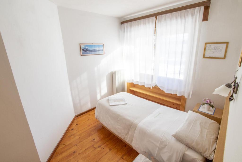 Postel nebo postele na pokoji v ubytování Hotel Edelweiss