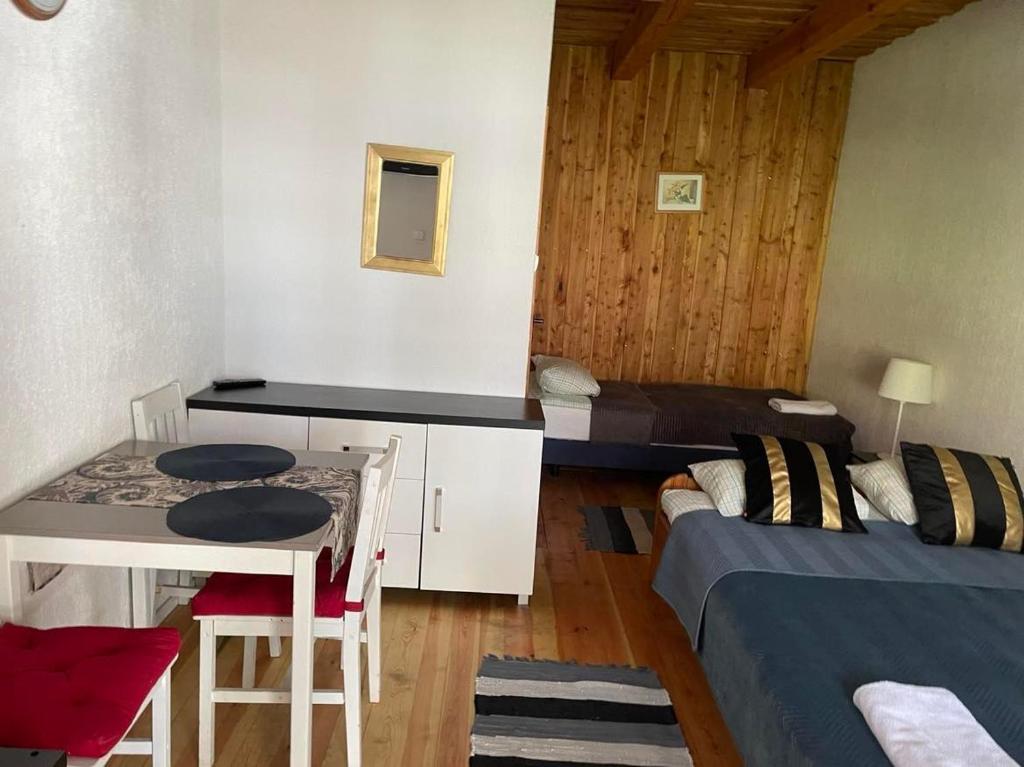 Letto o letti in una camera di Cezar Dom Wczasowy