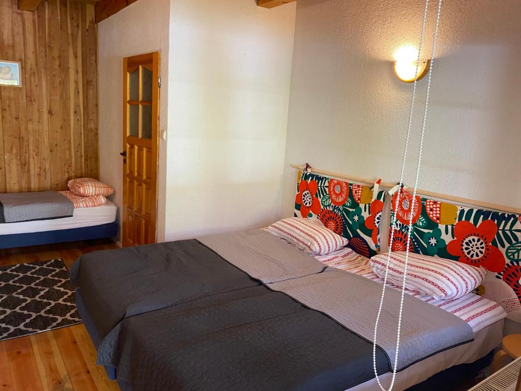 Letto o letti in una camera di Cezar Dom Wczasowy