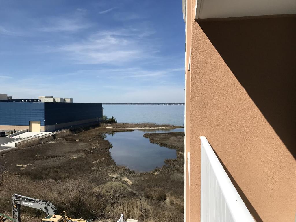 a view of a body of water from a building at Makai 403 in Ocean City