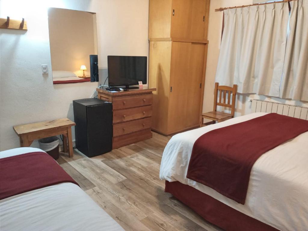 Postel nebo postele na pokoji v ubytování Hostería Nórdico Lake