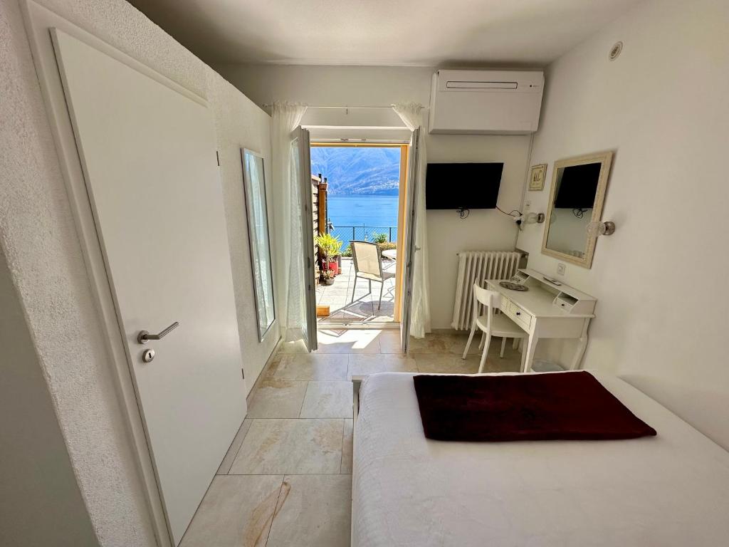 TV a/nebo společenská místnost v ubytování Hotel Garni Morettina