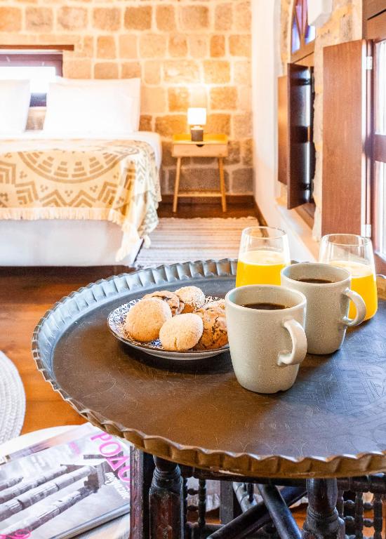 Postel nebo postele na pokoji v ubytování Mandorla Apartments