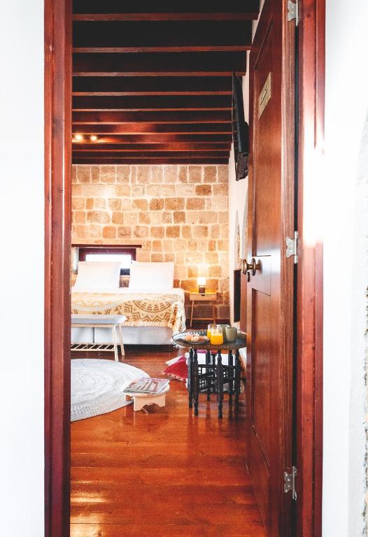 Postel nebo postele na pokoji v ubytování Mandorla Apartments
