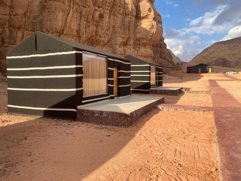 a rendering of a building in the desert at Wadi rum Ahmed Badawi in Wadi Rum