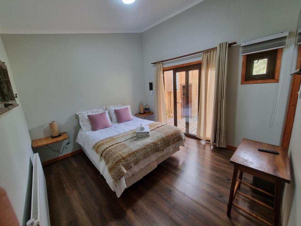 Postel nebo postele na pokoji v ubytování Hostel Torobayo