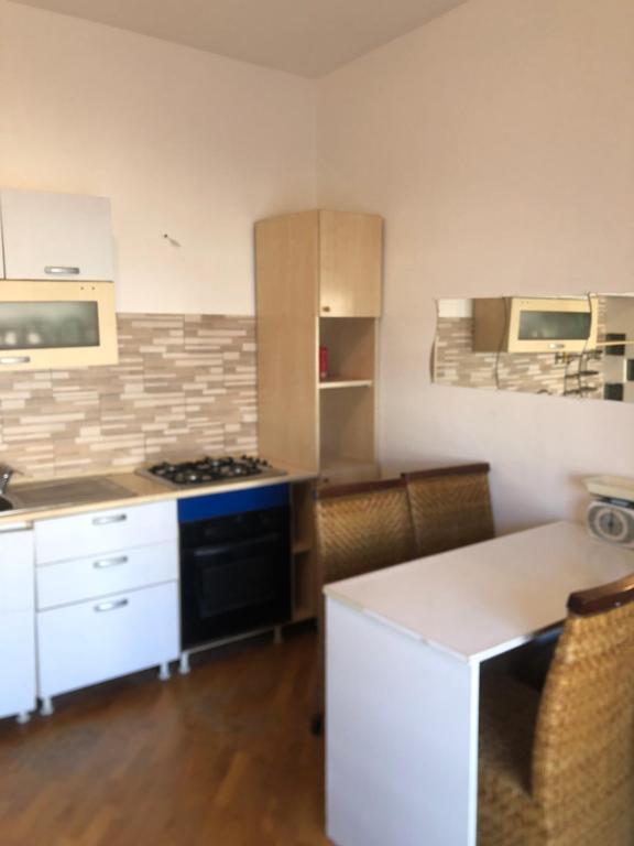 Kuchyň nebo kuchyňský kout v ubytování Casa Alighieri